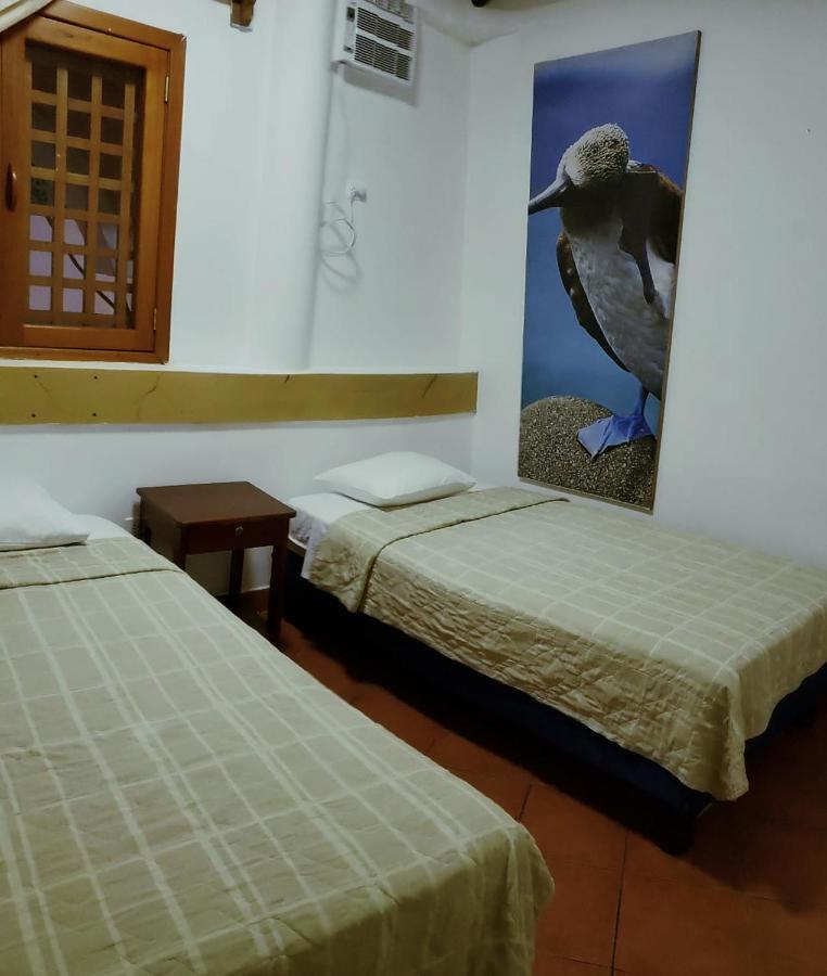 Hotel Crossman ปูแอร์โตอาโยรา ภายนอก รูปภาพ