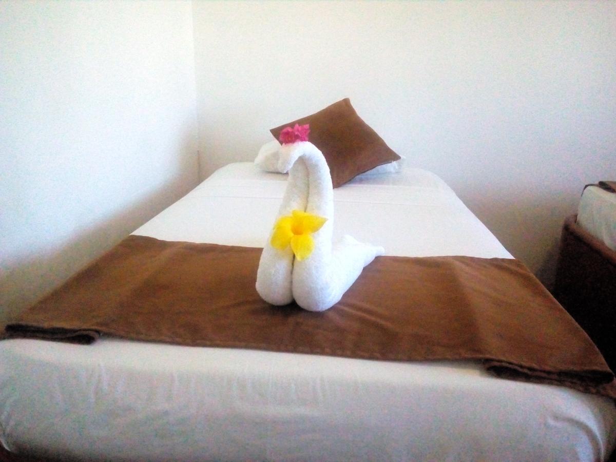 Hotel Crossman ปูแอร์โตอาโยรา ภายนอก รูปภาพ
