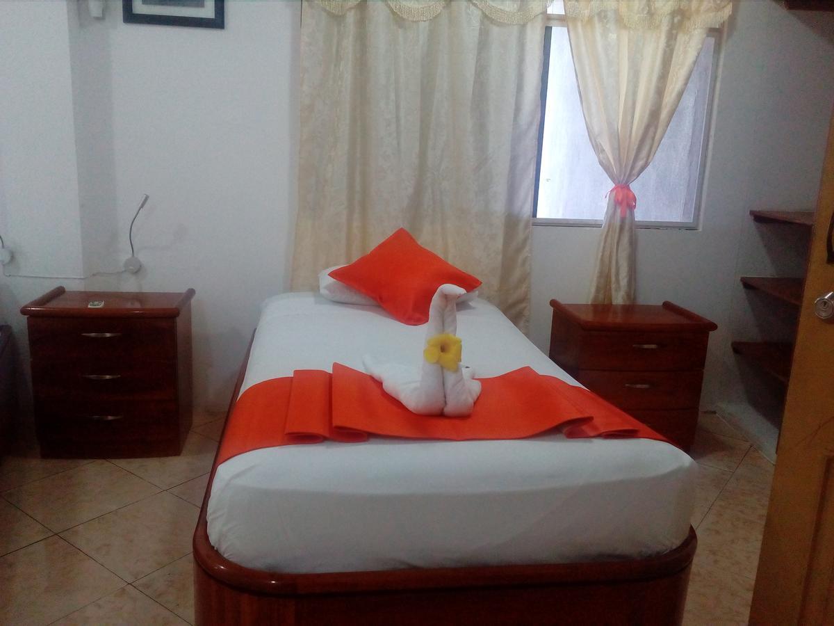Hotel Crossman ปูแอร์โตอาโยรา ภายนอก รูปภาพ